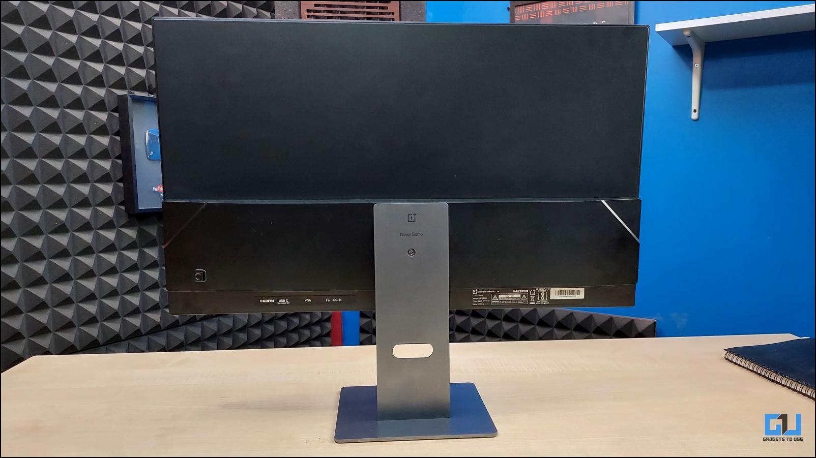 A OnePlus monitor placed on the table