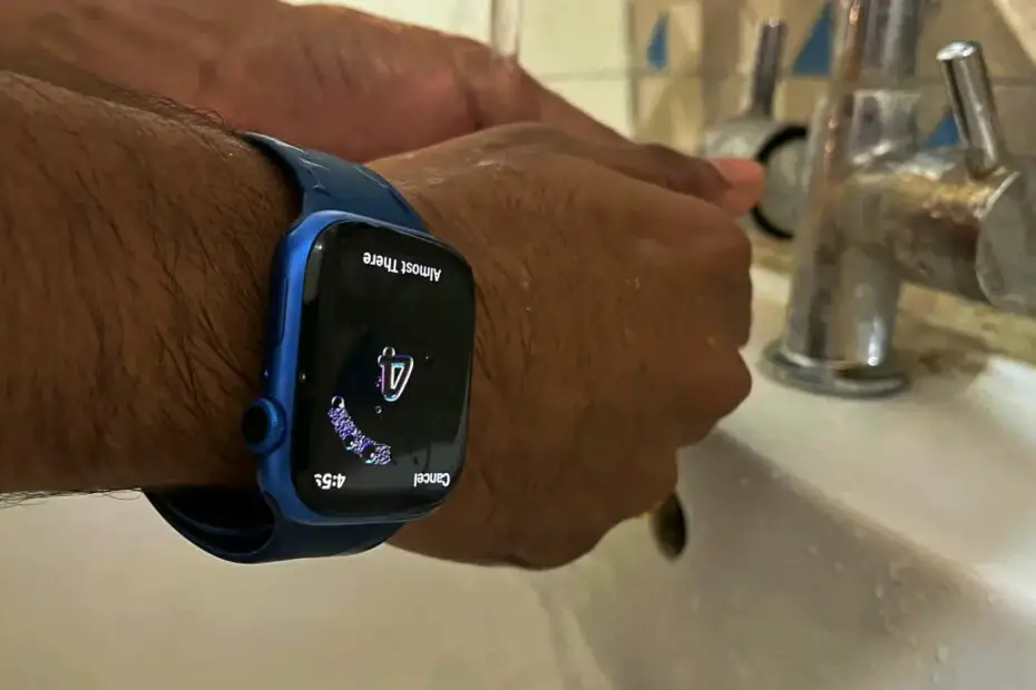 Apple Watch Showing Timer When Washing Hands under a Tap