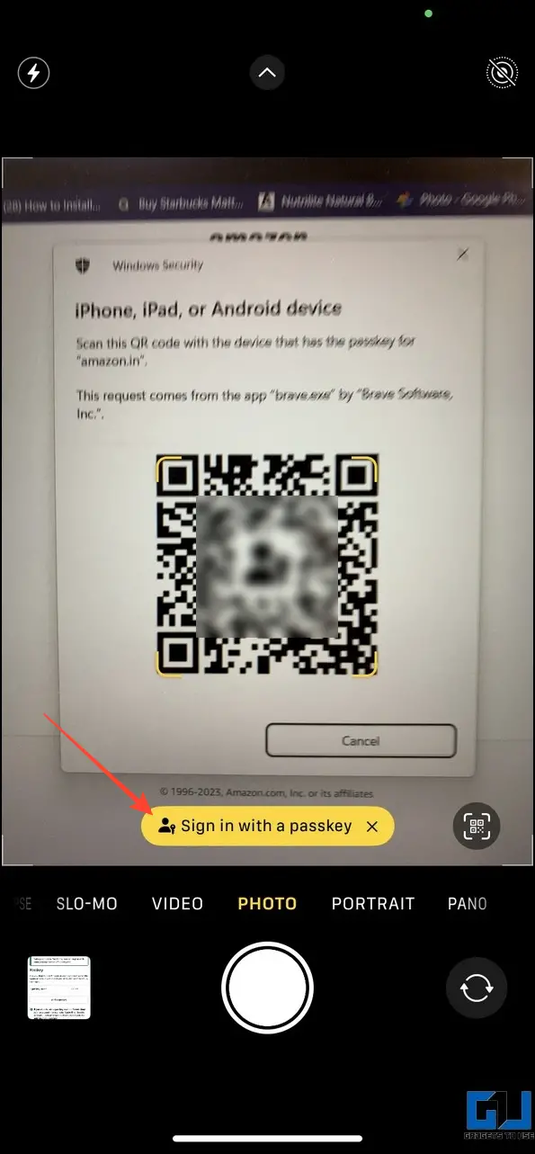 Tap Sign in with a Passkey to approve login