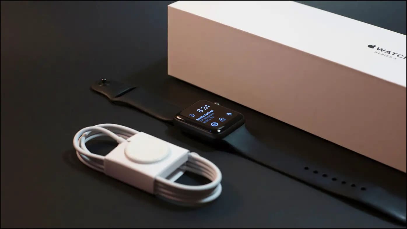 Apple Smartwatch Kept Along with Charger and Box