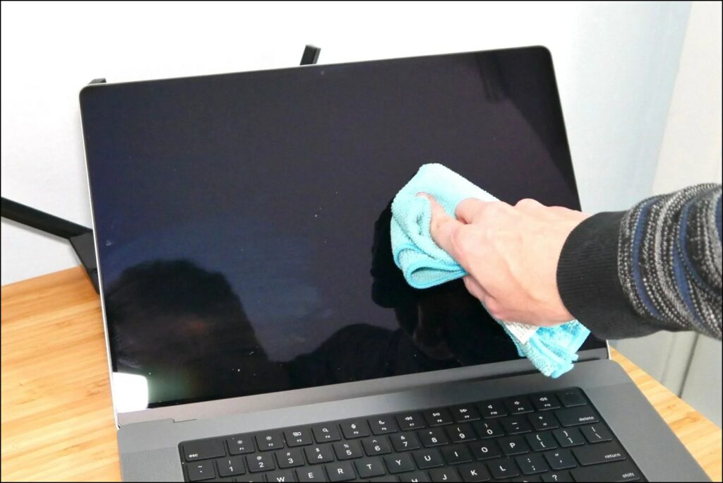 Clean MacBook with Micro Fiber cloth