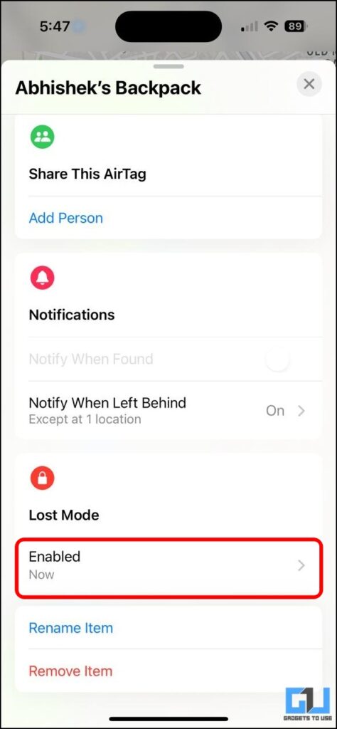 An AirTag's active Lost Mode enable toggle highlighted.