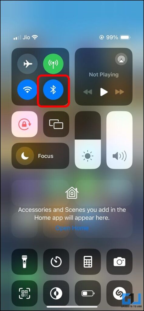 The Bluetooth toggle highlighted on the iPhone's control center.